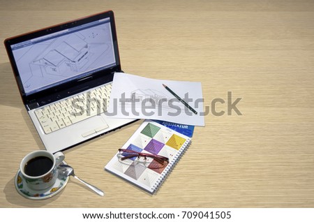 laptop and the scetch 