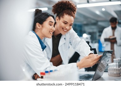 Laptop, scientist and women with smile, medical research and excited for results of test and pointing. Lab, online and conversation for medicine of healthcare, pharmaceutical and collaboration