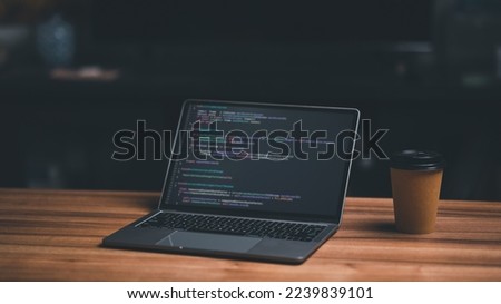 Laptop screen display blur script code, compiler, encode, debug, developer application software for business corporate with laptop computer. Instruction set of programming coding app from work at home