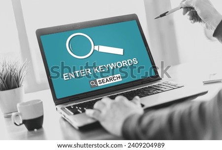 Laptop screen displaying a keywords search concept