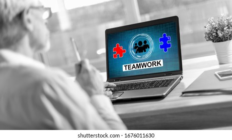 Laptop screen displaying a teamwork concept