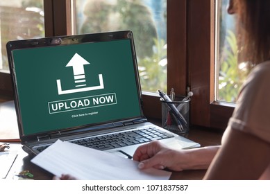 Laptop Screen Displaying An Upload Concept