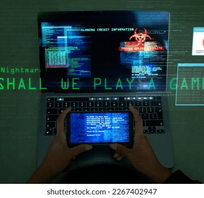 Laptop screen, hands and hacking data for online cyber crime, digital thief and coding software malware, phishing or fraud. Hacker phone app and cybersecurity overlay, ransomware on gaming computer