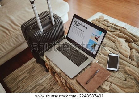 Laptop screen, travel website and suitcase background for vacation planning, hospitality marketing and hotel online blog advertising. Ux or ui web design, luggage and technology for contact us or faq