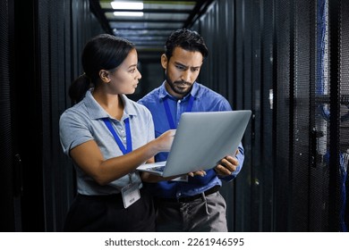 Laptop, server room and technician people problem solving in database management, system upgrade or cyber security. Error, data center or engineer employees, information technology and programming - Powered by Shutterstock
