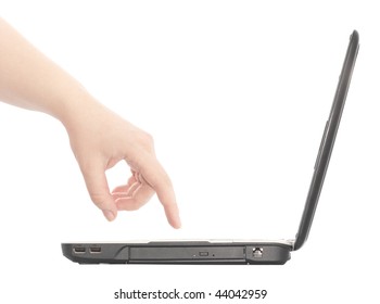 The Laptop A Side View A Female Hand Touch On Keys. Isolated Object