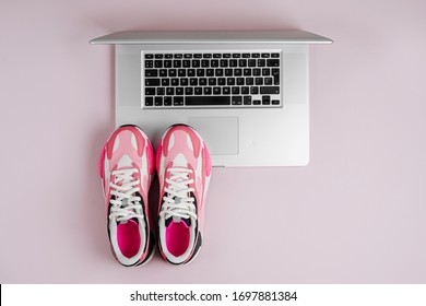 Laptop And Sneakers On A Pink Background. Online Fitness Program. Home  Workout. Top View, Flat Lay