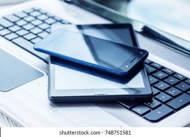 Laptop With Tablet And Smartphone On White Background