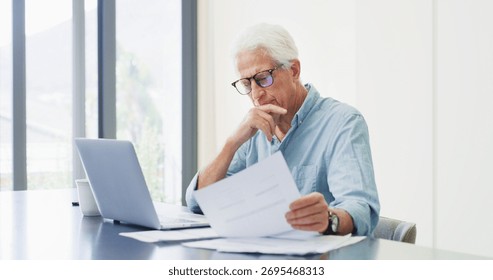 Laptop, thinking and old man with documents, financial analysis and bills with retirement fund. Pc, home and senior person with paperwork, debt and asset management with insurance policy and decision