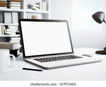 Laptop in white room - Shutterstock ID 197073401