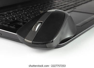 Laptop with wireless mouse - EDC everyday carry - empty space - white background - Powered by Shutterstock