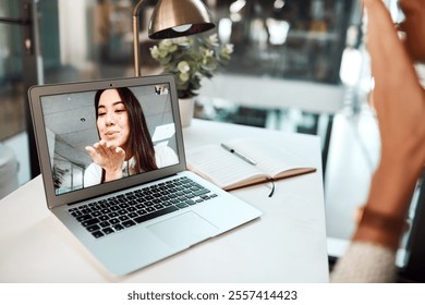 Laptop, woman and blow kiss on video call for love, care or long distance relationship of lesbian couple. Computer screen, romance or online chat for virtual connection, pov or valentines day at home - Powered by Shutterstock