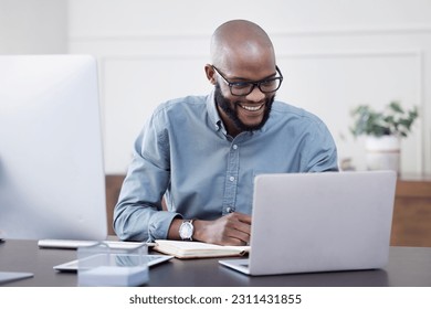 Laptop, writer and black man with notebook, smile and working on business project in office. Computer, happy and African professional taking notes, copywriting or research, planning and reading email - Shutterstock ID 2311431855