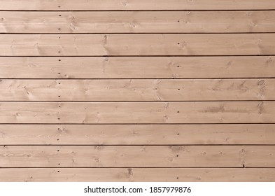 Larch wood wall background. Larch boards exterior paneling.