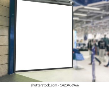 Large Advertisement Space At The Entrance Of A Retail Store With Blurred Background. This Blank Light Box Is Ideal For Video Wall Marketing, Digital Signage And Poster Ads