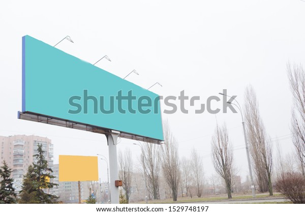 large advertising billboard light on the road in
the autumn winter season