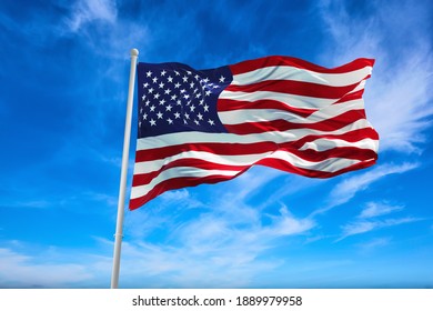 Large  American Flag Waving In The Wind