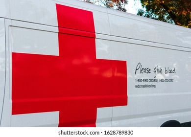 Large American Red Cross Sign On The Side Of White Emergency And Relief Vehicle - San Jose, California, USA - 2019