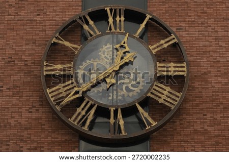 a large antique clock on the wall