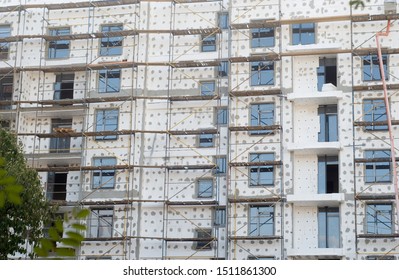 The large apartment building is sheathed with plasterboard - Shutterstock ID 1511861300