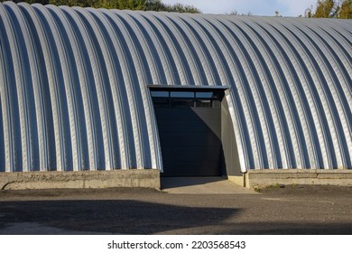 Large Arched Stainless Steel Hangar With Rolling Gates