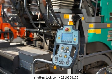 Large Asphalt Paver. Pavement Truck Remote Control Console Closeup.