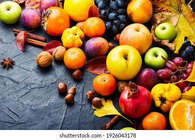 Large assortment of fruits,grapes and nuts.Autumn still life - Powered by Shutterstock