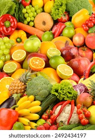 Large background of ripe berries, vegetables and fruits. Food concept. Top view