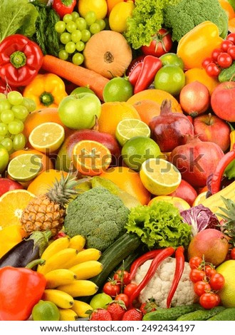 Large background of ripe berries, vegetables and fruits. Food concept. Top view