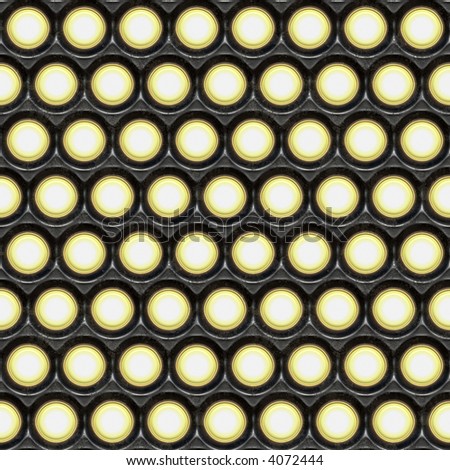 a large background of spot lights shining in the camera