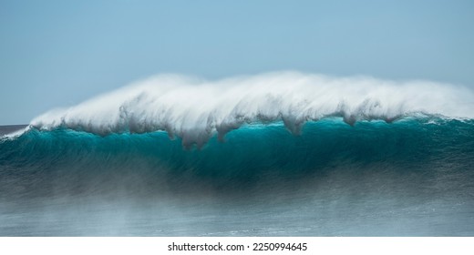 Large Backlit Wave Breaks on Wester Shore of Oahu - Shutterstock ID 2250994645