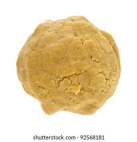 A Large Ball Of Cookie Dough On A White Background.