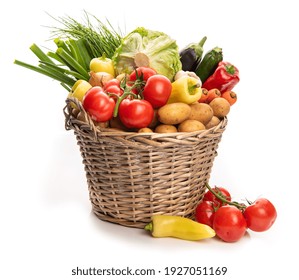 Large basket of vegetables. Potatoes, tomatoes, onions, cabbage, paprika, zucchini, eggplant. Isolate on white background - Powered by Shutterstock