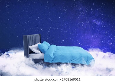 Large bed on fluffy clouds in starry night sky
