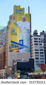 Large Billboard For Papal Visit Pope Francis Visiting NYC On The Side Of The Building - September 7, 2015, 8th Avenue, New York City, NY, USA