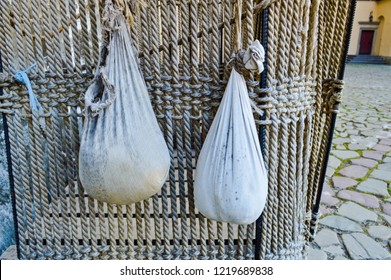 Large Black Iron Old Wooden Basket Of Ropes For A Balloon With An Anchor And Sandbags.