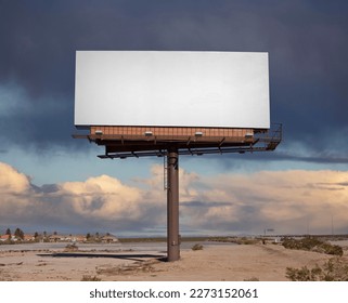 Large blank billboard with desert storm sky. - Shutterstock ID 2273152061