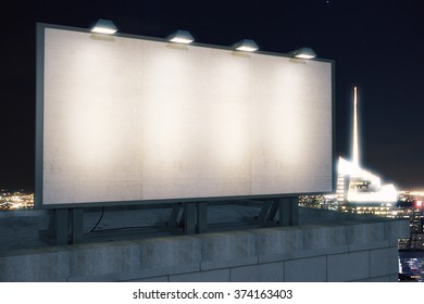 Large Blank Billboard On A Building Roof At Evening, Mock Up