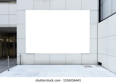 Large blank billboard on a street wall, banners with room to add your own text - Shutterstock ID 1536536441