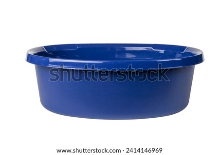 A large blue basin isolated on a white background. A water tank.