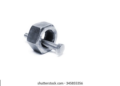 Large Bolt And Small Nut On White Background, One Size Does Not Fit All Concept