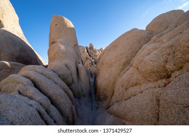 Large Boulders And Spires Along The Narrow Trail, Perfect For Rock Scrambling, Inside Of Joshua Tree National Park