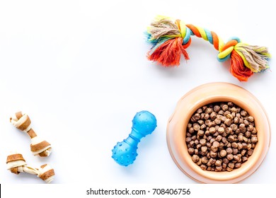 Large Bowl Of Pet - Dog Food With Toys On White Background Top View Mockup