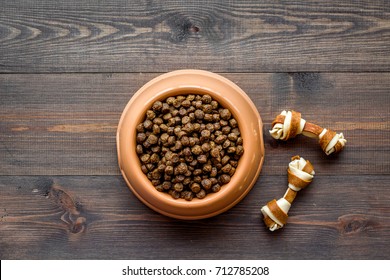 Large Bowl Of Pet - Dog Food On Wooden Background Top View Mockup