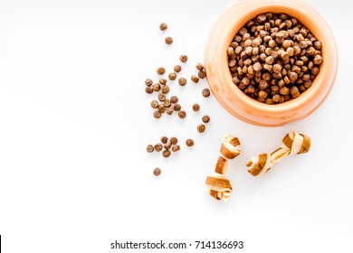 Large Bowl Of Pet - Dog Food Spilling On White Background Top View Mockup