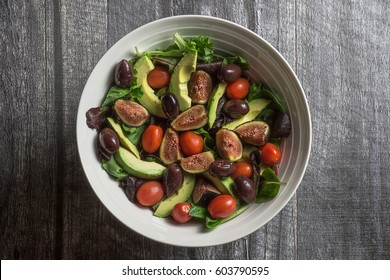 Large Bowl Of Salad On Wood 