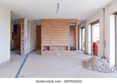 Large bright room with windows of an ancient villa undergoing renovation. The old walls have been torn down and new ones have been created. Nobody inside - Powered by Shutterstock