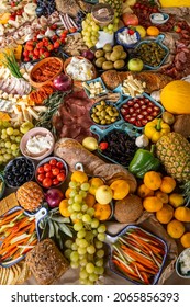 Large Buffet Table With Countless Vegetarian Dishes, Fruits, And Vegetables