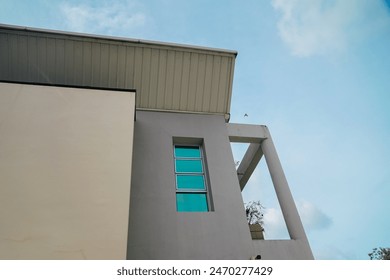 A large building with a window on the side