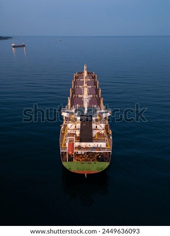 Large bulk carrier cargo ship Floating on Vast Water